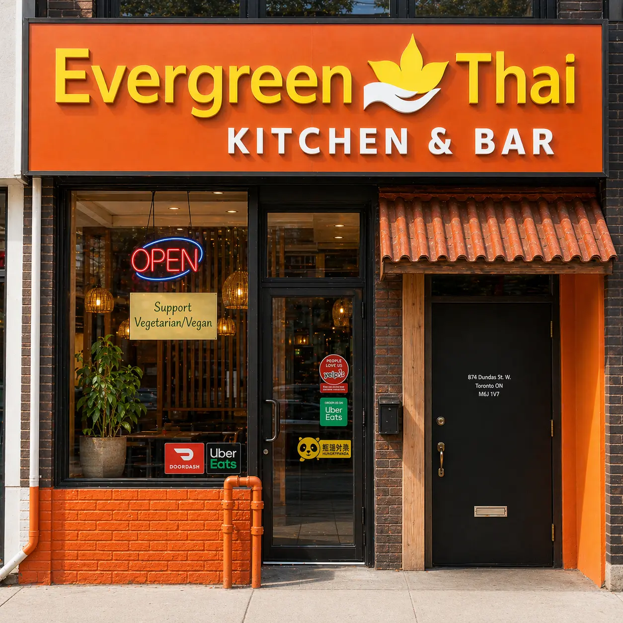 Evergreen Thai Kitchen & Bar storefront and sign at 175 Dundas St W in downtown Toronto