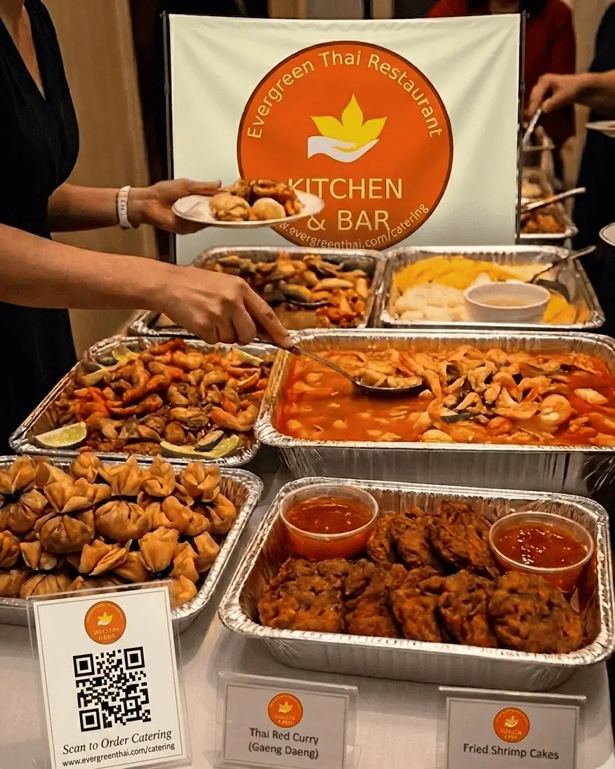 Collage of green curry pad thai satay spring rolls and buffet trays at a Thai catering setup