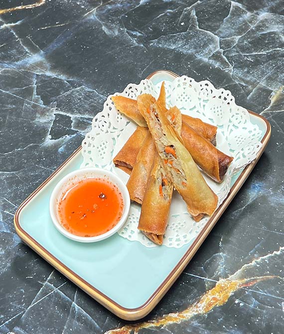 Evergreen Thai shared dishes arranged for a downtown Toronto group meal